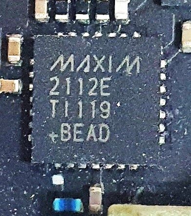 Satellite signal conversion tuner, marked MAXIM 2112E TI119 +BEAD