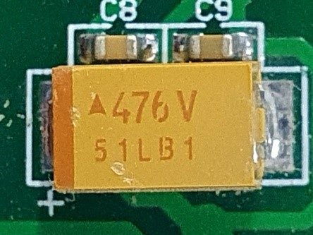 Tantalum capacitor, marked 476V 51LB1