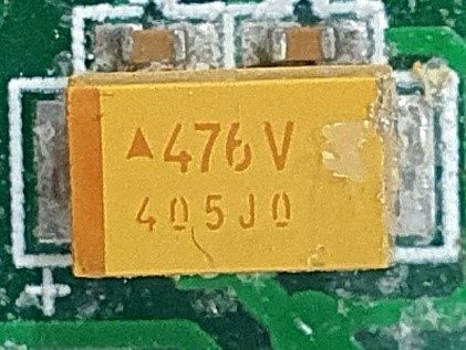 Tantalum capacitor, marked 476V 405J0