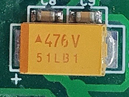 Tantalum capacitor, marked 476V 51LB1