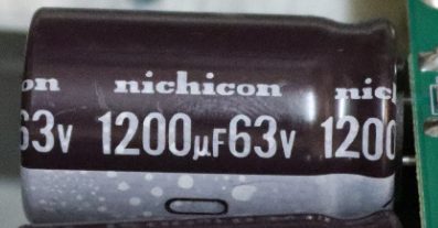 Electrolytic capacitor, marked Nichicon 1200mkF 63v
