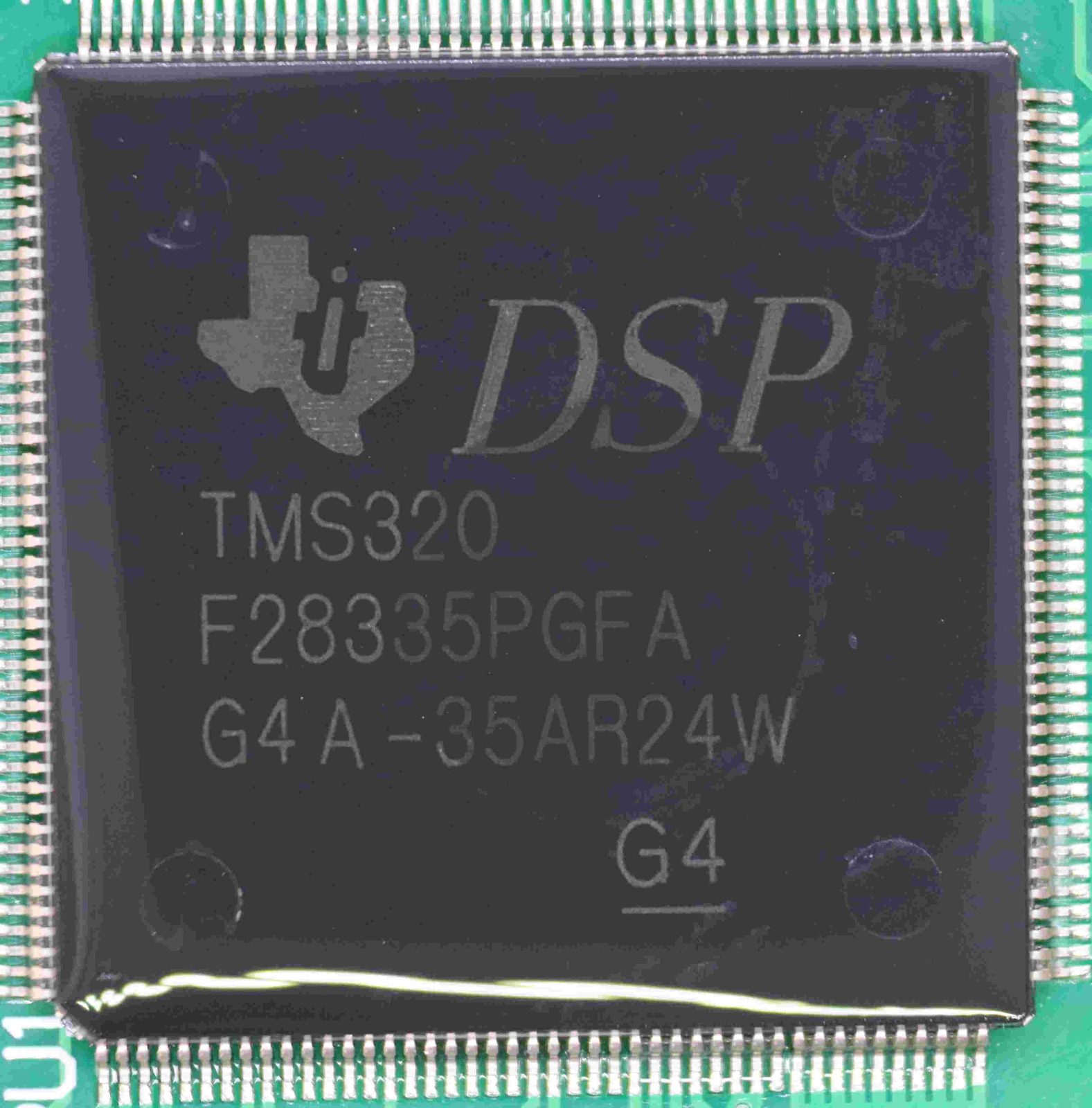 A 32-bit real-time microcontroller for signal processing, marked TMS320 F28335PGFA G4A-35AR24W G4