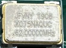 Quartz oscillator, marked JFVNY 1908 XO75NAQUC 62.00000MHz