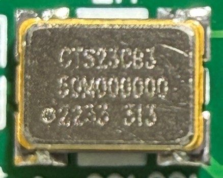Clock oscillator 50MHz, marked CTS23CB3 50M000000 2233 313