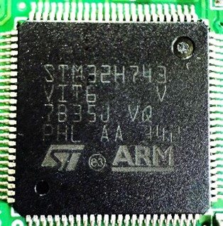 A 32-bit microcontroller, marked STM32H743VIT6 7B35J VQ PHL AA 342