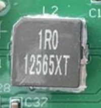 Power inductor, marked 1R0 1265XT