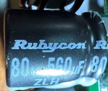 Electrolytic capacitor, marked 560uF 80v