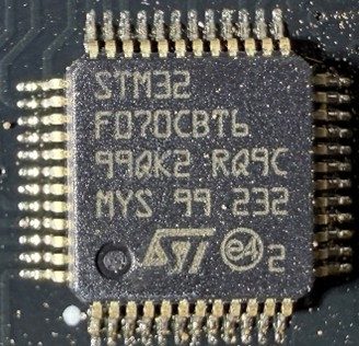 Microcontroller 32-bit, marked STM32F070CBT6 99QK2 RQ9C MYS 99 232