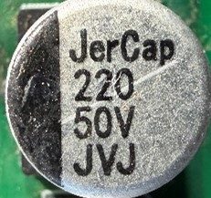 Capacitor, marked 220 50V JVJ