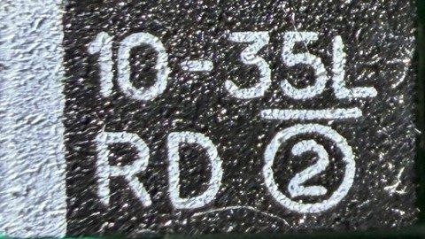 Tantalum capacitor, marked 10-35L RD