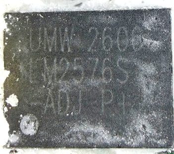 Voltage regulator, marked UMW 2606 LM2576S ADJ P+