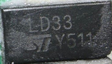 Linear voltage regulator, marked LD33 Y511