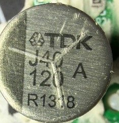 Capacitor, marked J40 120 R1318