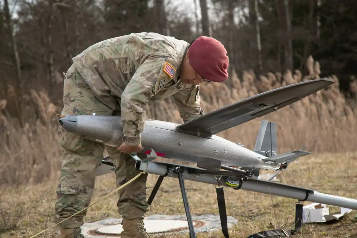 Preparing a Hornet kamikaze drone for catapult launch.