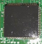 microcircuit, marked TL16C552AFN 21A IDRW C4