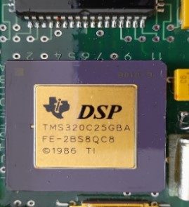 Microcircuit, marked DSP TMS320C25GBA FE- 2BS8QCB 1986 TI