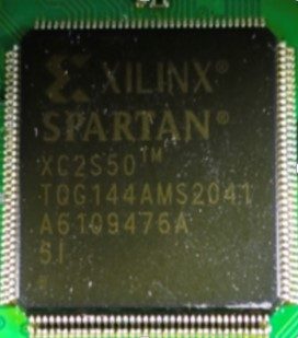 FPGA, marked XILINX SPARTAN XC2S50 TQG144AMS2041 A6109476A 5.I