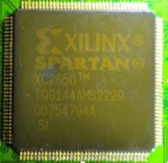 FPGA, marked XILINX SPARTAN XC2S50 TQG144AMS2229 D6754794A 5I