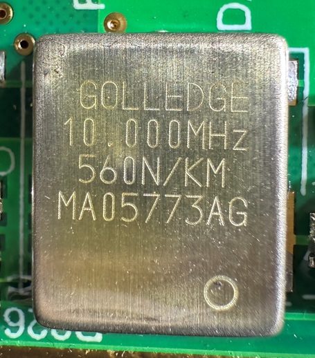Quartz oscillator, marked 10.000MHz 560N/KM MA05773AG