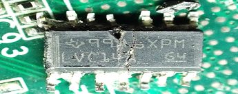 Hex inverting Schmitt trigger, marked 99A6XPM LVC14A
