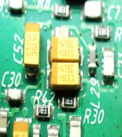 Tantalum capacitor, marked 475С 10СЕ3