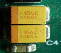 Capacitor, marked 156C 30E04
