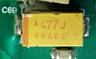 Capacitor, marked 477J 90A4E