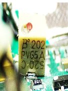 Trimmer potentiometer, marked B˚ 202 PVG5A 520C