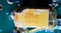 Tantalum capacitor, marked 226Е 70В14