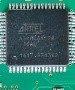 8-bit microcontroller with 16Kb/32Kb/64Kb flash system programming, marked ATMEL AT90CAN128 -16AU 1417 9F4362
