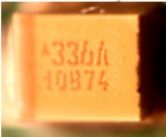 Tantalum SMD capacitor, marked 336A 10B74