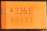 Tantalum SMD capacitor, marked 336E 60523