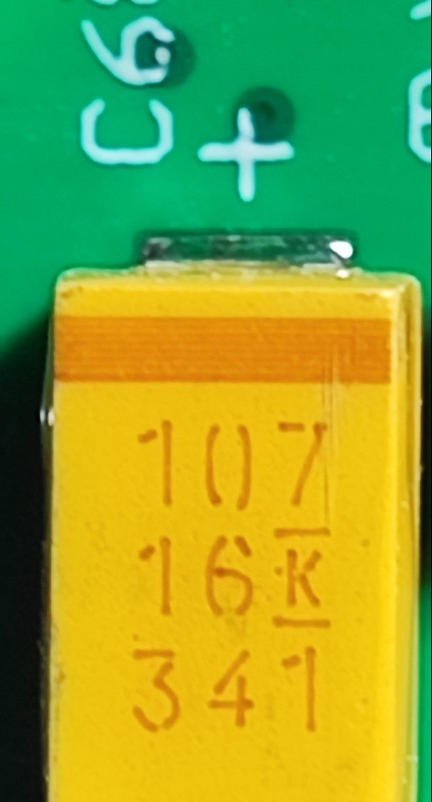 Tantalum capacitor, marked 107 16K 341