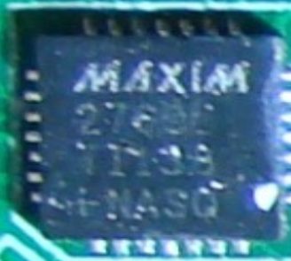 GPS/GLONASS receiver chip, marked MAXIM 2769E TI 138 + NASQ