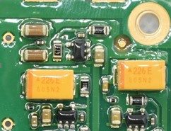 Tantalum SMD capacitor, marked 206E 805N2