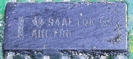 Quadruple 2-Input Exclusive-OR Gate, marked SN74AHCT86 94AETQK AHCT86