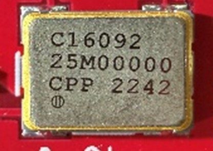 Clock generator, marked C16092 25M00000 CPP 2242