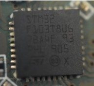 32-bit microcontroller, marked STM32 F103T8U6 7BA4F 93 PHL 905