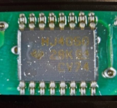 CMOS logic chip (HE), marked HJ404050 28К СМ74